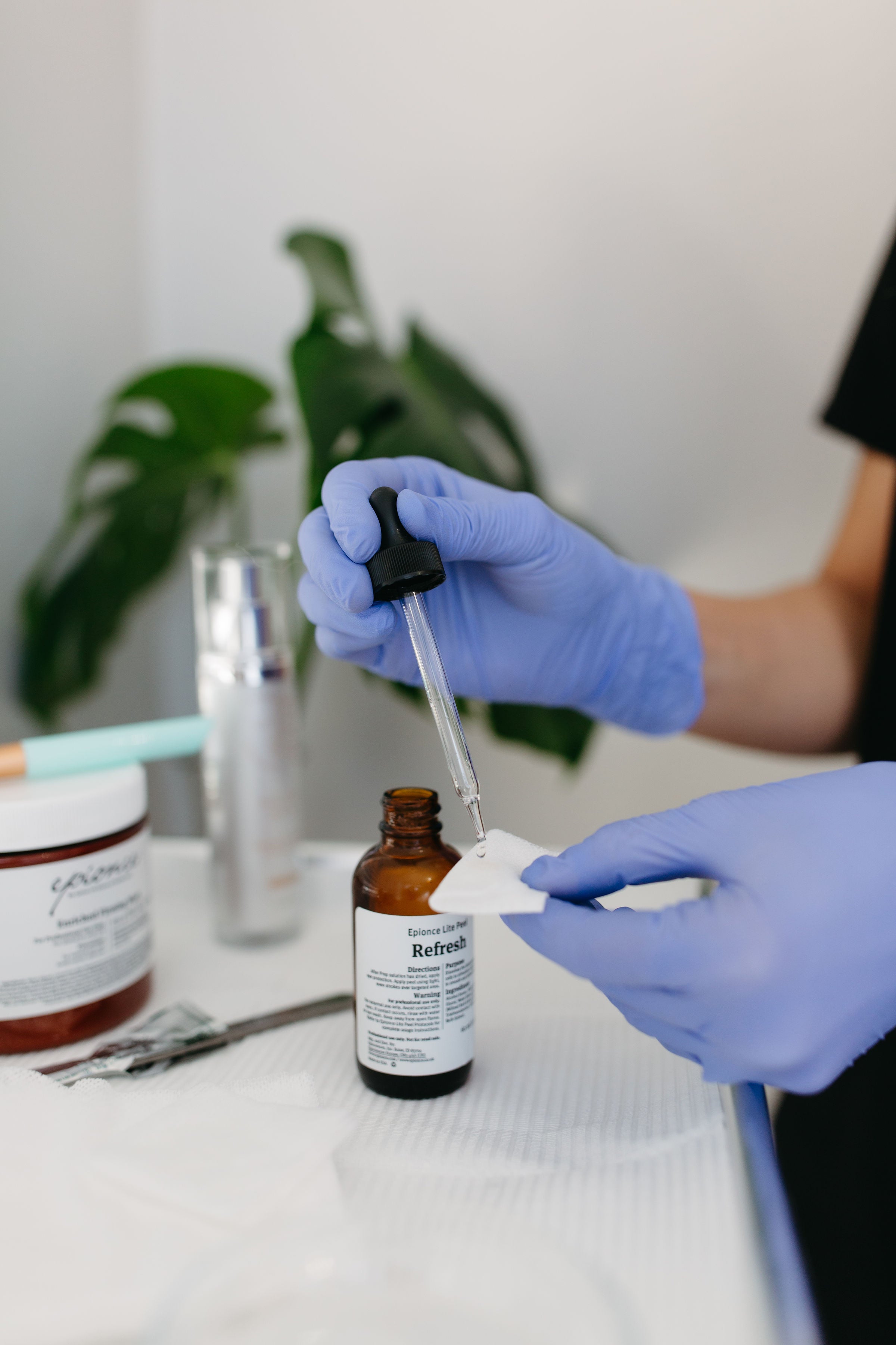 Preparing Refresh Peel Treatment for Nuud Skin Co